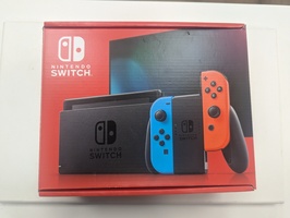 Nintendo Switch with Blue and Red Joy-con in original box